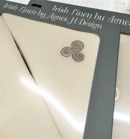 Newgrange Triple Spiral on Ivory and Sandstone Irish linen dinner napkins