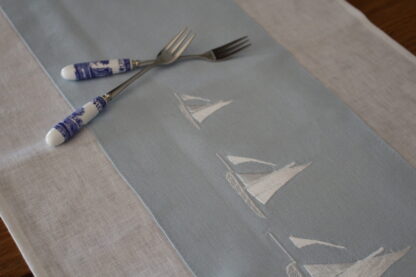 Galway Hooker on blue insert and white Irish linen.  Sale