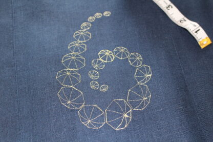 Umbrella swirl table runner in indigo - Image 2