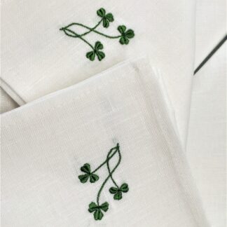 Three little Shamrocks/ dinner napkins on ivory Irish linen.