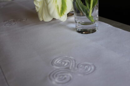 Newgrange Triple Spirals on white linen. back in stock and on Sale!! - Image 3