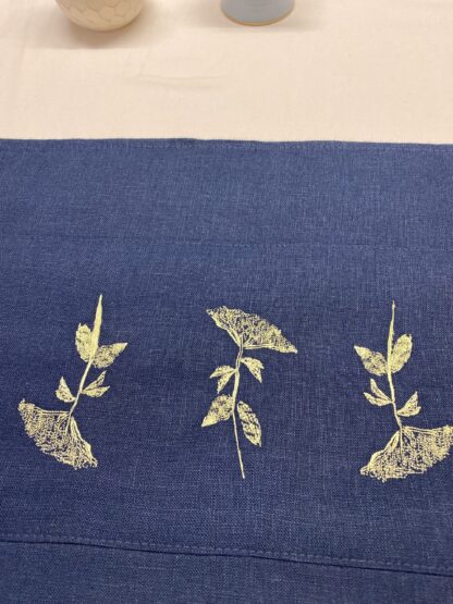 Indigo Irish table runner with wild elderflowers embroidered in Gold
